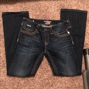 low almost mid rise boot cut denim jeans